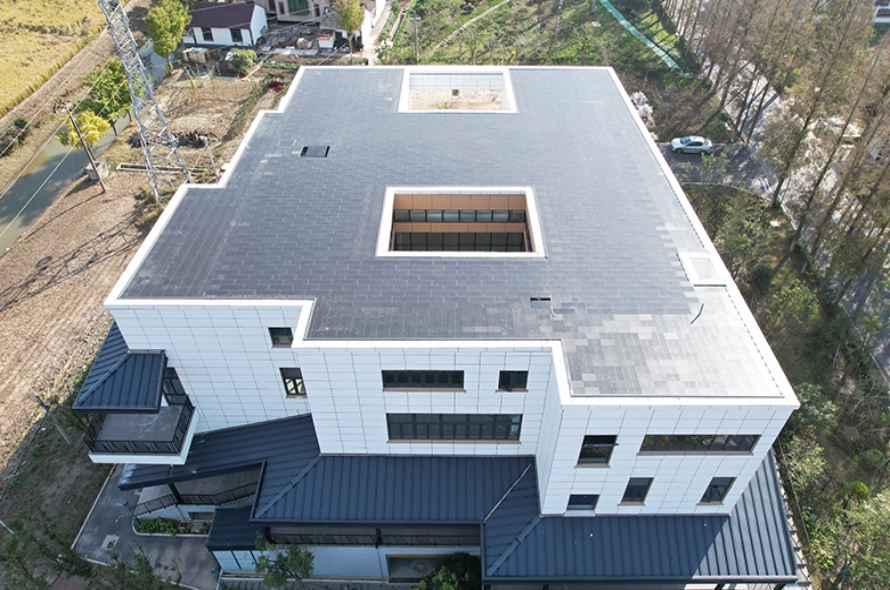 Building with solar roof tiles installed